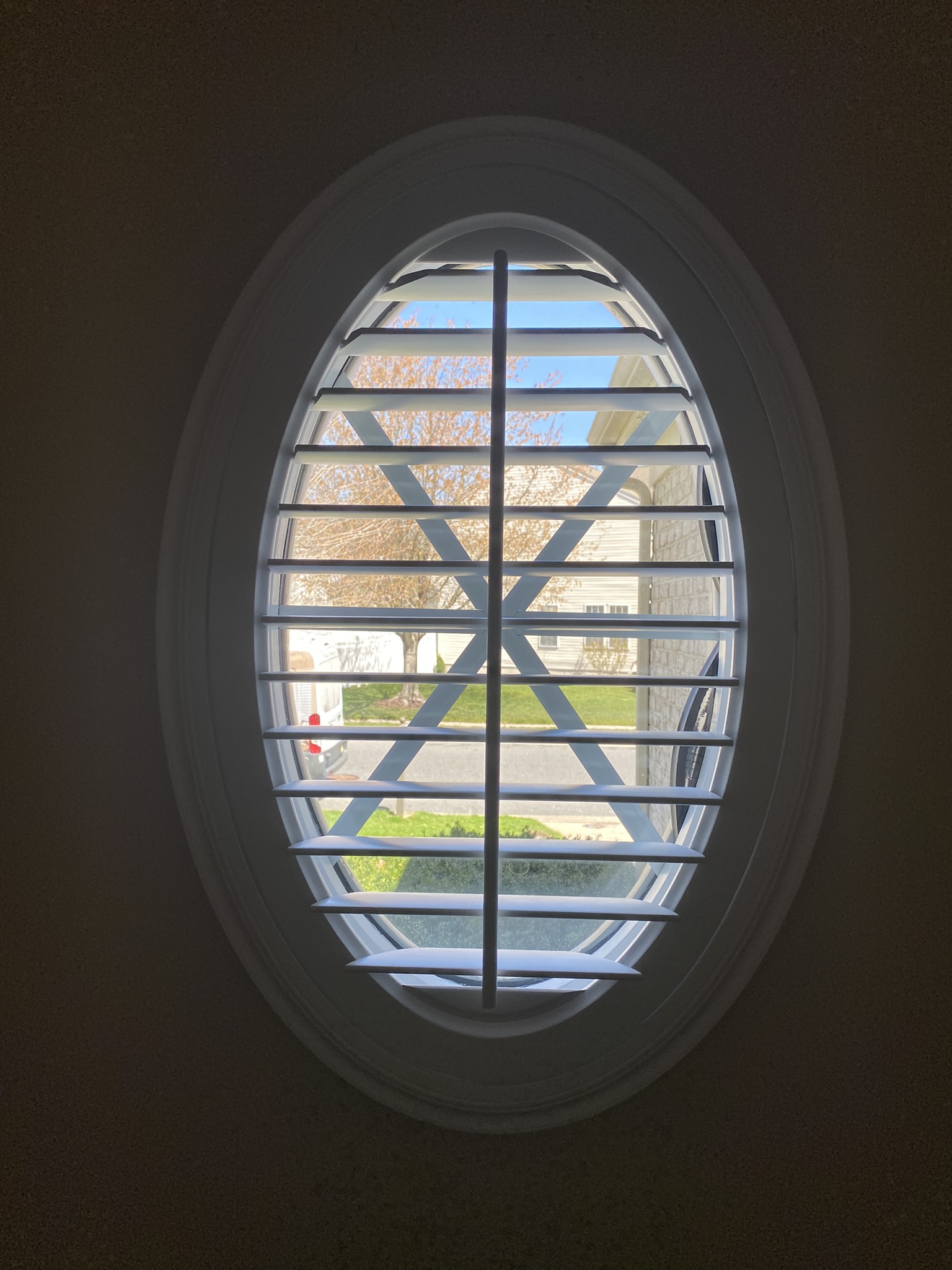 Circle arch plantation shutter