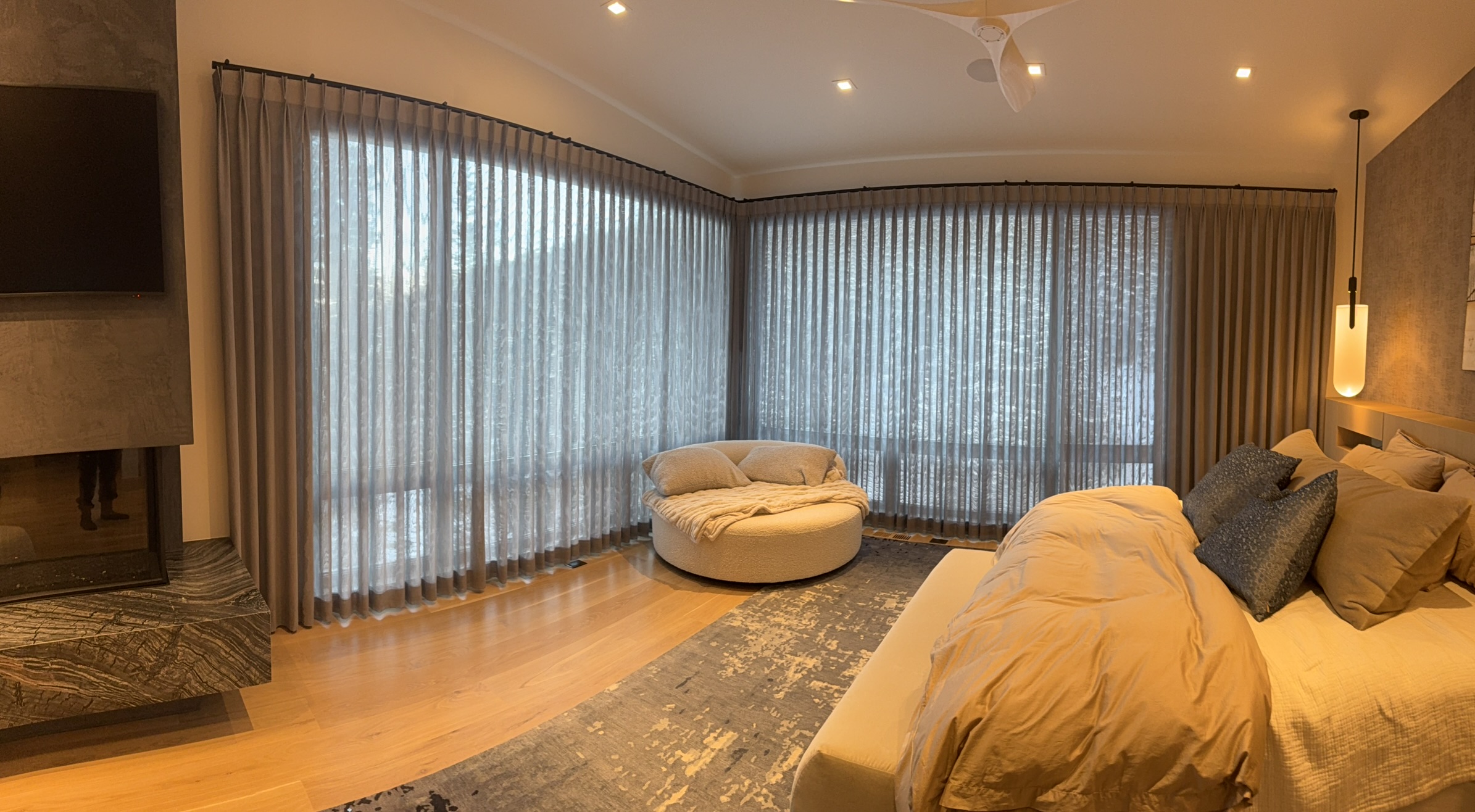 Luxury bedroom floor-to-ceiling wave drapery