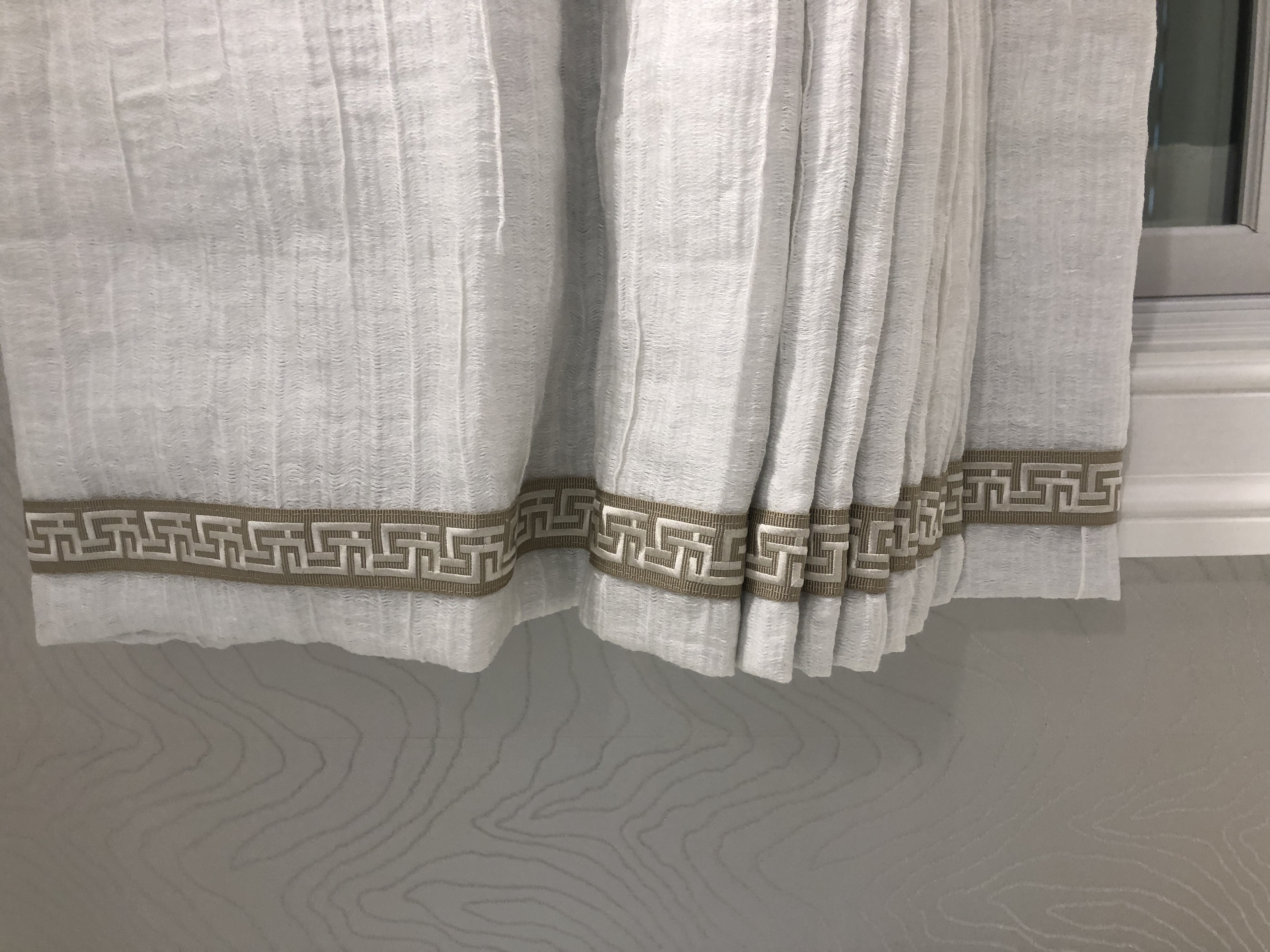 Flat Roman shade with Greek key trim